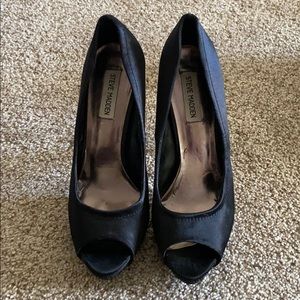 Black, satin Steve Madden heels.